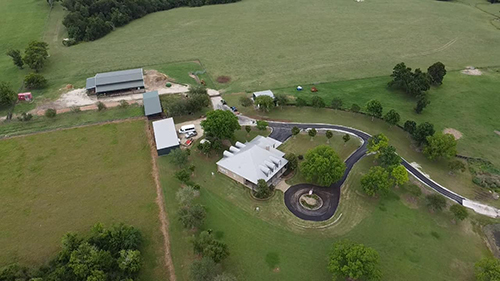 Asphalt-Driveway-2sm country home with circle seal coated drive.