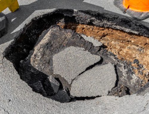 4 Reasons to Repair Potholes on Your Commercial Parking Lot